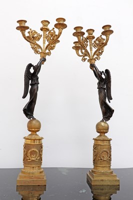 Lot 761 - A pair of Empire-style gilt and patinated bronze candelabra