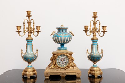 Lot 599 - A gilt bronze and Sèvres style porcelain clock garniture