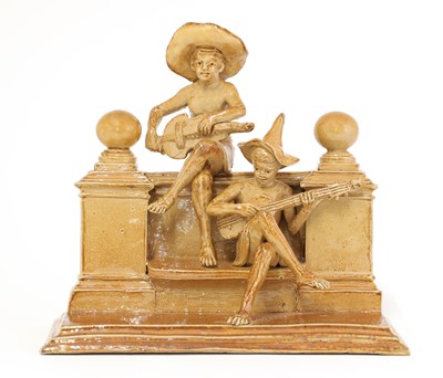 Lot 72 - A Doulton stoneware double 'Merry Musician' group