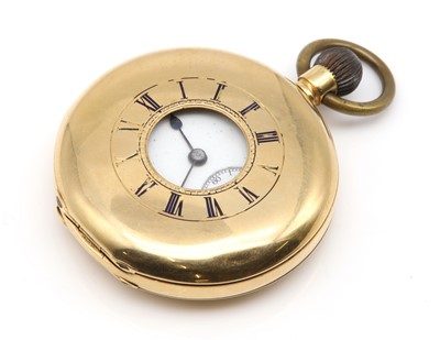 Lot 555 - An 18ct gold half hunter pocket watch