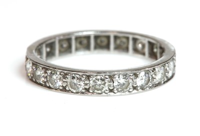Lot 171 - A diamond set full eternity ring