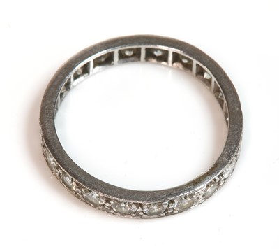Lot 171 - A diamond set full eternity ring