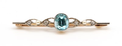 Lot 36 - An Edwardian gold blue zircon, diamond and pearl brooch