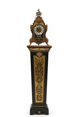 Lot 218 - A reproduction Boulle effect clock on a column