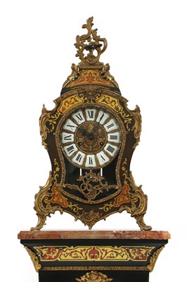 Lot 218 - A reproduction Boulle effect clock on a column