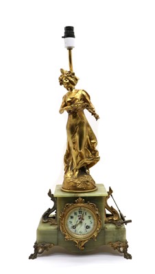 Lot 294 - A late Victorian French bronze and green onyx mantel clock lamp