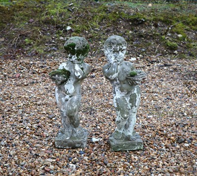 Lot 495 - A pair of reconstituted stone figures