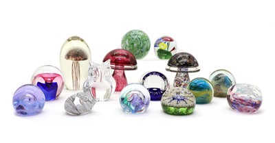 Lot 130 - A collection of fifteen glass paperweights