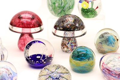 Lot 130 - A collection of fifteen glass paperweights