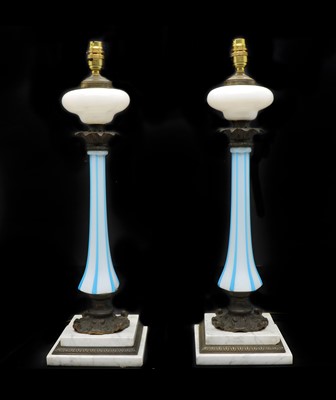 Lot 329 - A pair of opaline glass table lamps