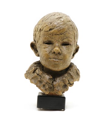 Lot 305A - A patinated plaster bust of a boy