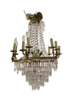 Lot 481 - A French Empire-style brass and cut glass chandelier