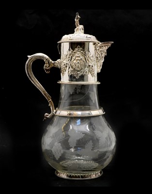 Lot 309 - A silver plated and glass claret jug