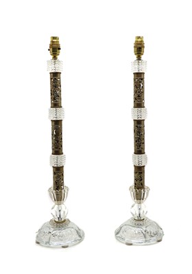 Lot 205 - A pair of cut glass and brass table lamps