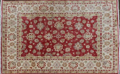 Lot 404 - An Agra design carpet