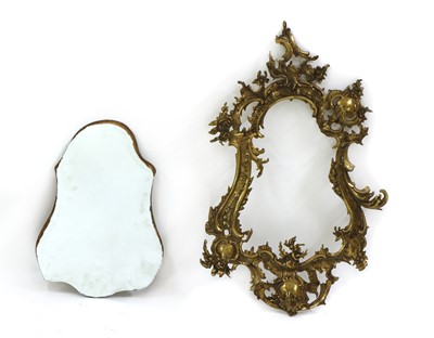 Lot 272 - A brass Rococo-style mirror