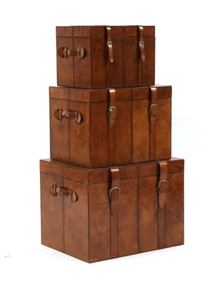 Lot 355 - A graduated set of three leather trunks