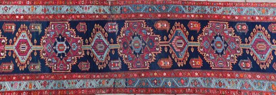 Lot 435 - A North West Persian runner