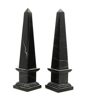 Lot 307 - A pair of black marble obelisks