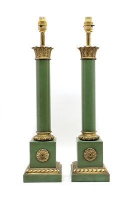 Lot 332 - A pair of green and gilt metal lamps