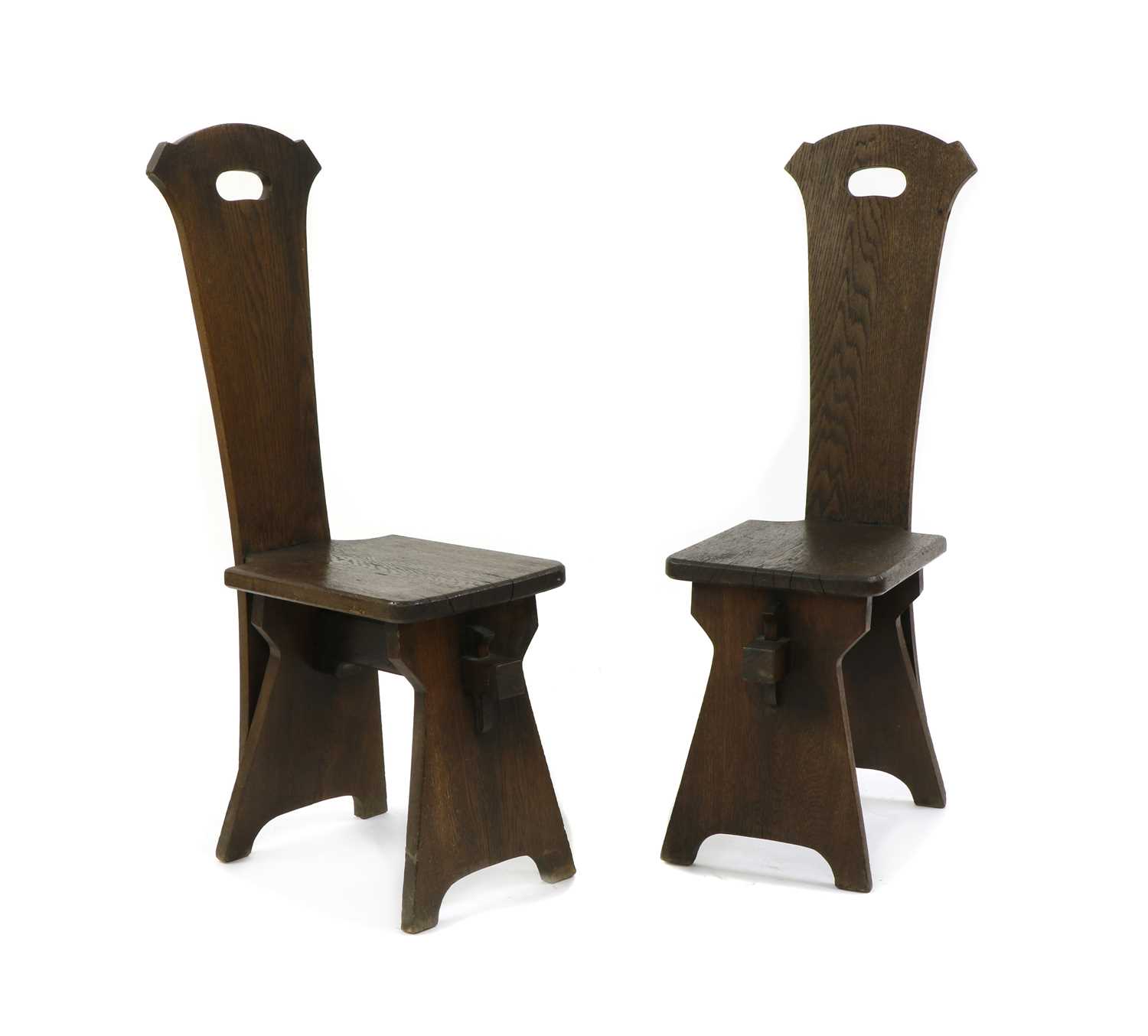 Lot 12 - A pair of American Arts and Crafts oak hall chairs
