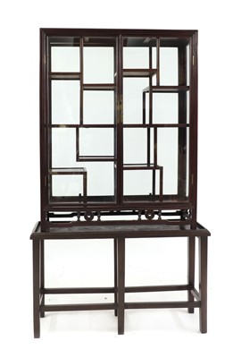 Lot 459 - A Chinese hardwood display cabinet