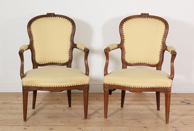 Lot 159 - A pair of Transitional period walnut fauteuils