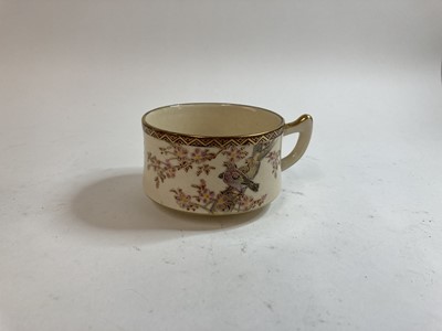Lot 77 - A set of three Japanese Satsuma ware tea cups and saucers