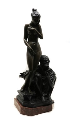 Lot 304A - A bronze figure group