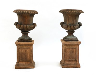 Lot 355A - A pair of terracotta garden urns and stands