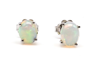Lot 228 - A pair of silver single stone opal stud earrings