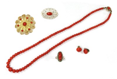 Lot 133 - A single row graduated coral bead necklace