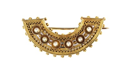 Lot 43 - A Victorian gold pearl set crescent brooch