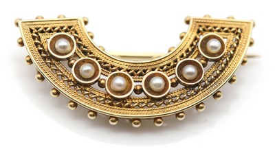 Lot 43 - A Victorian gold pearl set crescent brooch
