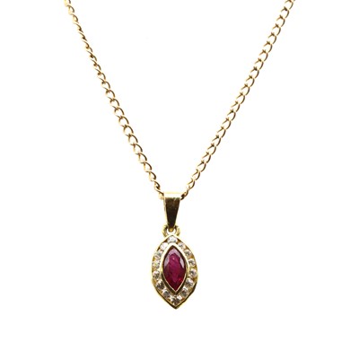 Lot 110 - A gold ruby and cubic zirconia cluster pendant