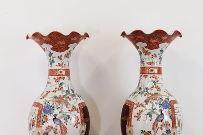 Lot 516 - A pair of large Kutani vases