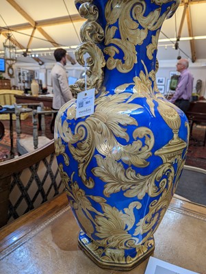 Lot 501 - A large ironstone pottery vase and cover
