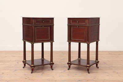 Lot 551 - A pair of Empire-style walnut and brass strung bedside cabinets