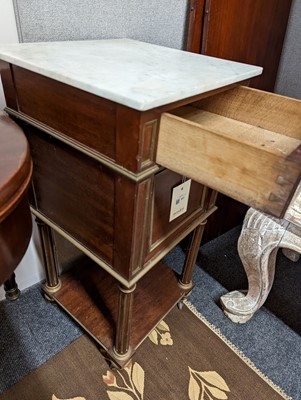 Lot 551 - A pair of Empire-style walnut and brass strung bedside cabinets