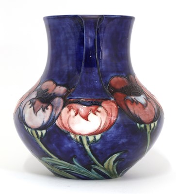 Lot 146 - A William Moorcroft ‘Poppy’ pattern pottery vase