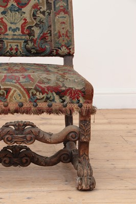 Lot 490 - A carved walnut-framed side chair