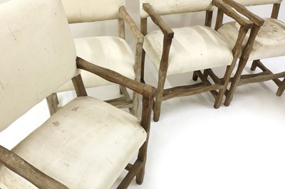 Lot 184 - A set of six limed oak armchairs