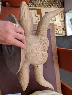 Lot 452 - A large unglazed stoneware bull's head