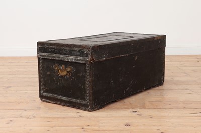 Lot 430 - A leather and brass trunk