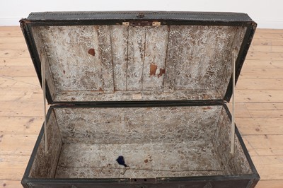 Lot 430 - A leather and brass trunk