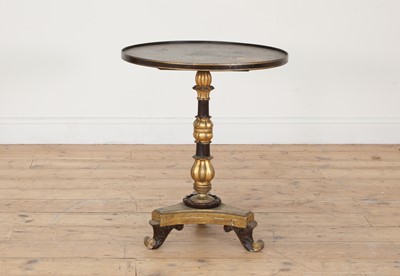 Lot 533 - A circular low occasional table