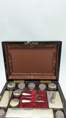Lot 274 - A Victorian workbox with brass and mother of pearl inlay