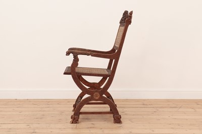 Lot 96 - A carved sandalwood elbow chair