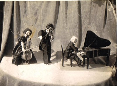 Lot 212 - The Jacquard Puppets 'The Cello Trio'