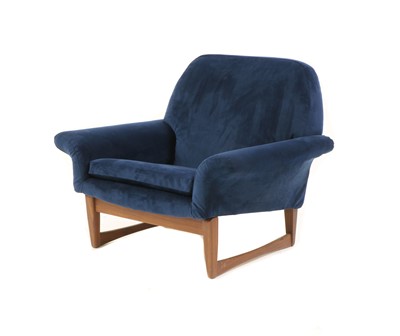 Lot 582 - A blue velvet 'Carmen' lounge chair